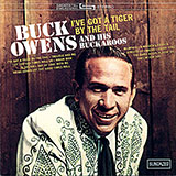 Buck Owens picture from I've Got A Tiger By The Tail released 06/25/2010